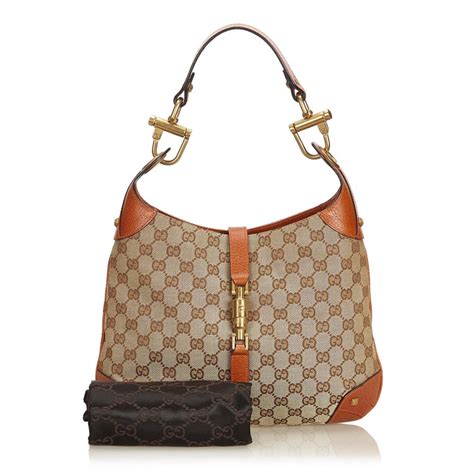 vintage gucci brown & gold designs|Gucci Brown Vintage Bags, Handbags & Cases for sale .